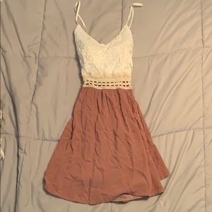 Lace mini dress with cross back